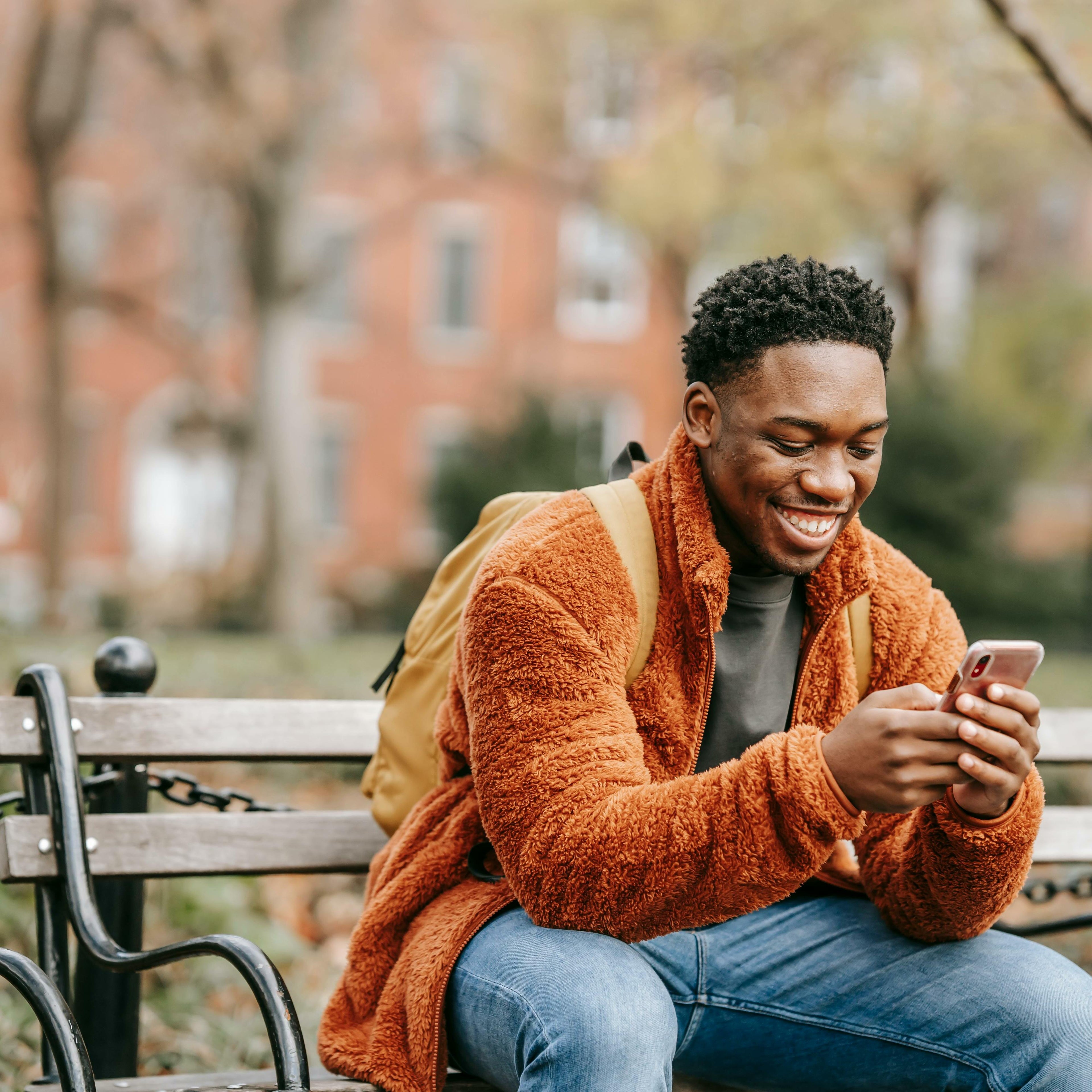 Man on the bench with a smartphone